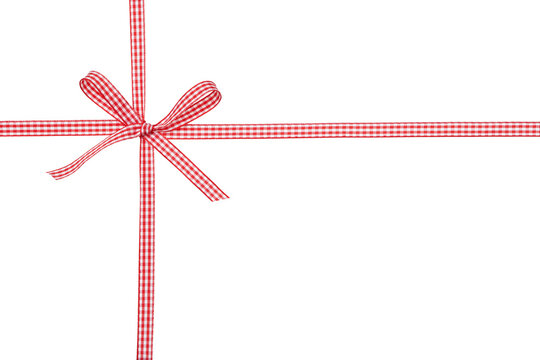 Red and white Christmas ribbon with bow isolated on white background