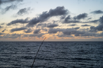 fishing at sunset