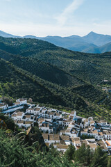Fototapeta na wymiar Aereal view of the white village of Zahara de la Sierra in Andalusia, Spain.