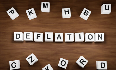 Deflation, price cut and low demand. White dice with dark capital letters on a table. Economy, business and deflation concepts. 3D illustration