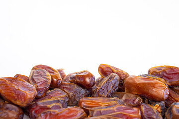 Stack of date fruits isolated on white background, space for text