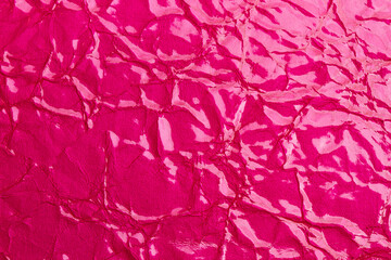 Textura fondo agrietado rosa. Vista de cerca