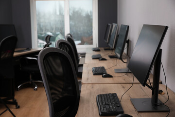 Many modern computers in open space office