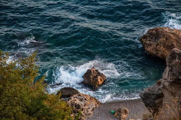 waves crashing on rocks