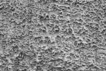 Painted wall with coarse texture, rough texture closeup. Grey plaster with brushed texture, house wall, 3d background, copy space