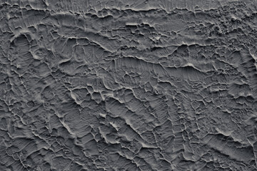 Painted wall with coarse texture, rough texture closeup. Grey plaster with brushed texture, house wall, 3d background, copy space