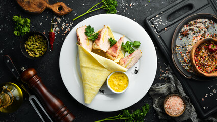 Chicken roll with bacon and asparagus. Restaurant dish. Menu. Top view.