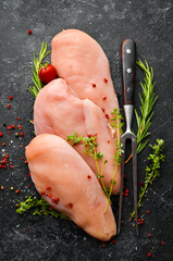 Meat. Raw chicken fillet with spices. Top view. Rustic style.
