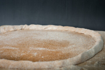 Close up view of tasty italian pizza crust, pizza dough