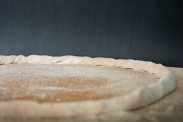 Close up view of tasty italian pizza crust, pizza dough