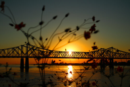 Scenic view of the Natchez–Vidalia Bridge in Louisiana on a sunset sky background