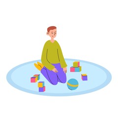 A cute child is playing with cubes and a ball. Kindergarten, preschool education.