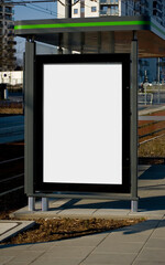 Outdoor advertising billboard at the bus stop.