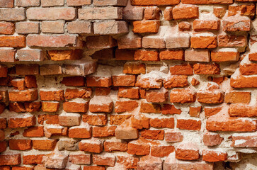 Old brick wall. Abstract background. Brickwork with cement.