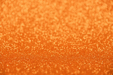 Abstract background of orange bokeh lights