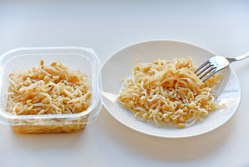 Sprouted beans on a white plate salad