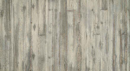 texture of old gray grunge concrete wall with embedded grain and pattern of wooden planks for background
