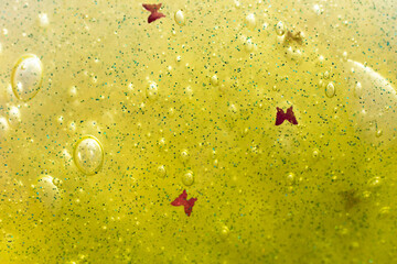 Macro photography of the slime texture.Abstrat green background with copy space.