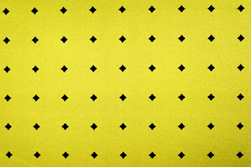 Black diamonds on a yellow background, vertical and horizontal rows