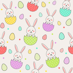 Cute Easter rabbits and eggs. Design of a seamless texture. Vector
