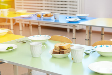 Table setting before meals kindergarten in Russia