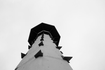 Low angle view of a tower with sharp metal objects on it
