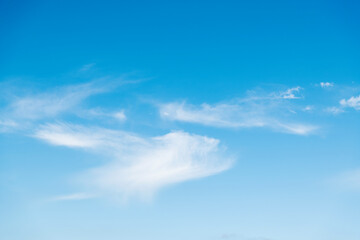 Blue sky with white clouds background