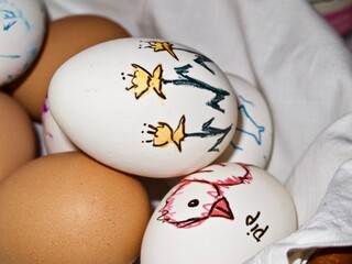 Boiled and hand decorated chicken eggs for traditional eating at Easter Eve.
