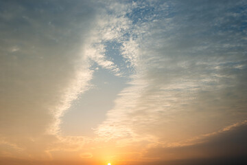 Sunset sky with white clouds