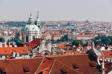 Roofs of Prague with Saint Nicholas Cathedral