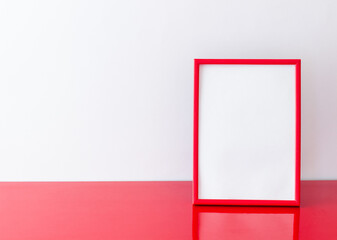 Red frame on a white background. Design. Mock-up. Copy space.