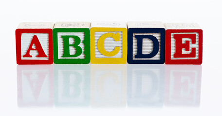 Alphabet ABCDE blocks on white background