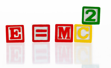 E=MC2 writing with wooden blocks