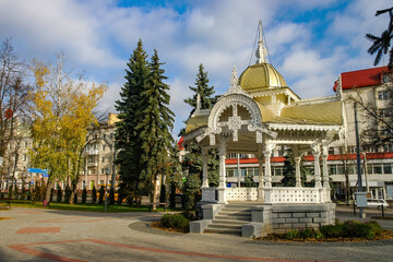 Scenic view of carved wooden romantic gazebo - Altanka - symbol of Sumy city, Ukraine