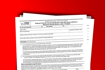 Fototapeta premium Form 15288 documentation published IRS USA 43962. American tax document on colored