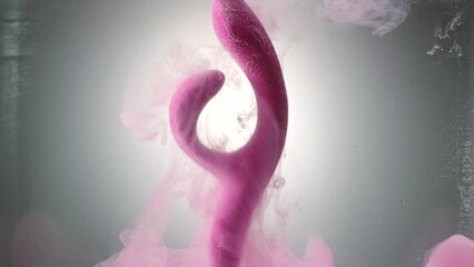 Vibrator for woman. Creative. Sex toy or vibrator to satisfy woman. Stylish vibrator for woman in water. Advertising of sex toys and vibrators