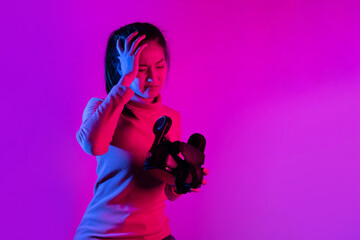 Woman Hold VR Headset Suffer From Motion Sickness