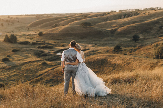 Wedding couple in mountain hill