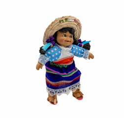 Female doll in colorful traditional clothes of Mexican people on a white background