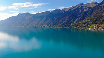 The crystal clear blue water of Lake Brienz in the Swiss Alps - Switzerland from above