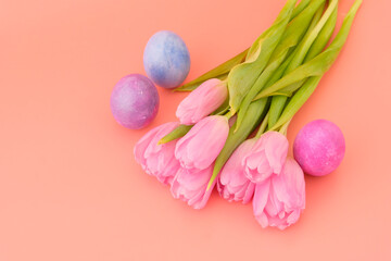 Beautiful pink tulips and Easter eggs, pink, blue, blue. Easter concept. Greeting card, trend color