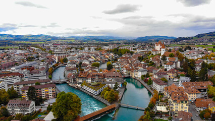 Fototapeta na wymiar Aerial view over the city of Thun in Switzerland - amazing drone footage