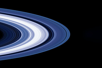 Rings of Saturn on a dark background. Elements of this image furnished by NASA © Artsiom P