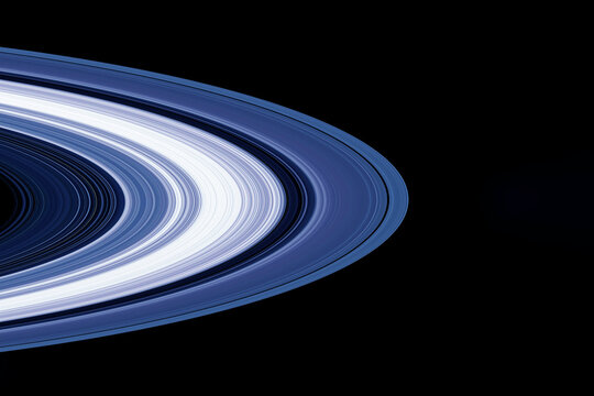Rings of Saturn on a dark background. Elements of this image furnished by NASA