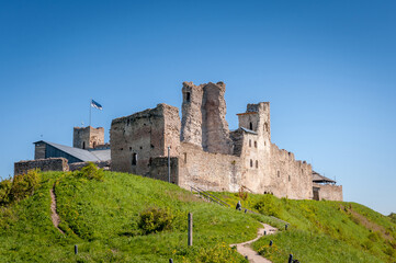 Landscape with medieval Rakvere castle, Estonia. Ruins of a medieval knight's castle in sunny spring day.