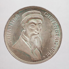 Germany - circa 1968: a 5 Deutsche Mark coin of the Federal Republic of Germany showing a portrait of the German inventor of the printing press Johannes Gutenberg