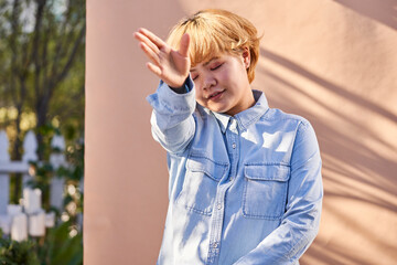 woman dancing with hand up