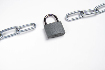 Chain and padlock on an isolated background. closed door. Metal chain.