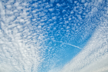 beautiful clouds against the blue sky,High white cirrus clouds with cirro-stratus in a light blue...