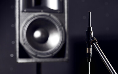 Sound acoustic testing in studio. The noise meter measures the volume of the speakers and the...